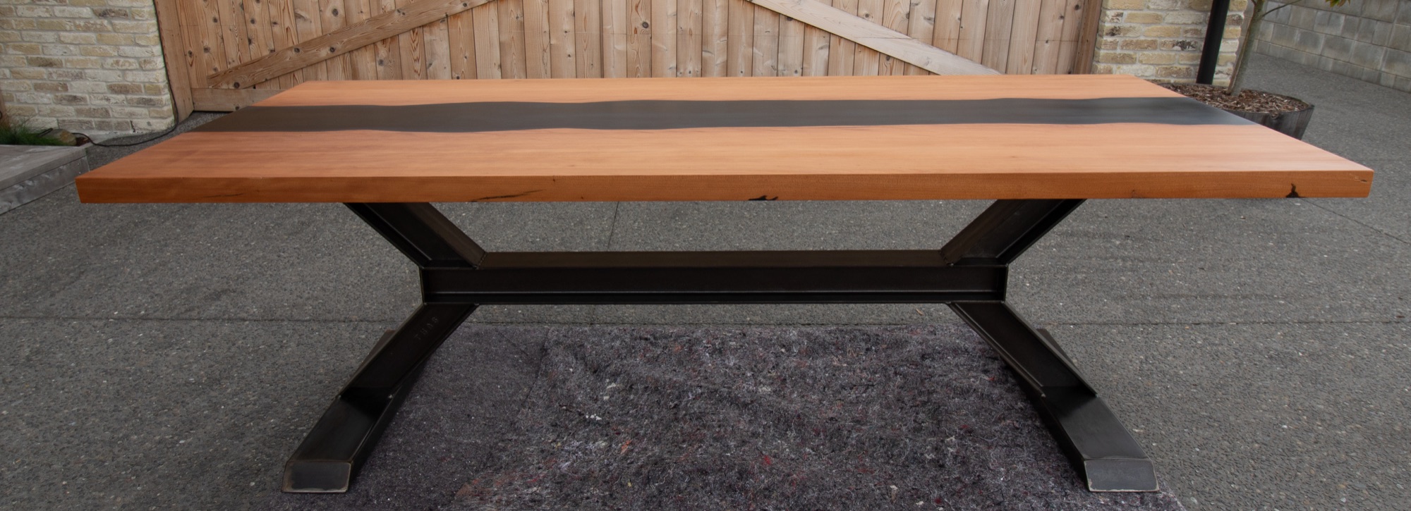 Front profile of the Ancient Kauri River Table and raw steel base